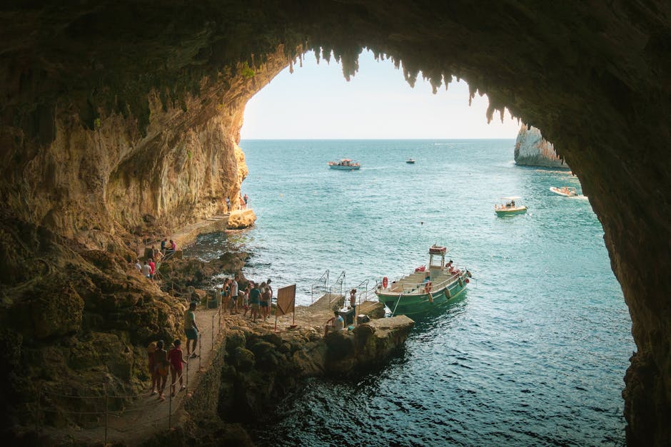 Sea cave near Lecce, rocky landing and small boats