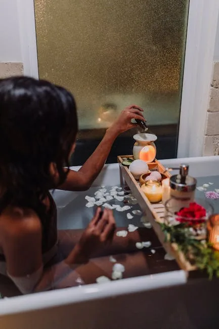 Person in candlelit bathtub with petals and bath tray in Lecce