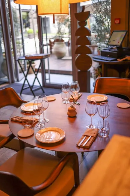 Round table set for a romantic dinner in a Lecce restaurant