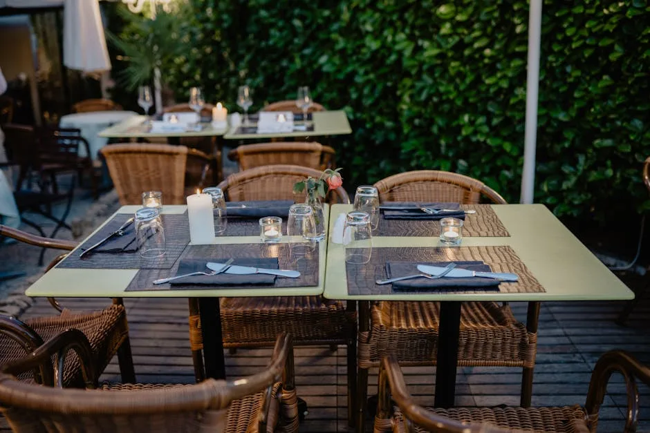 Romantic outdoor restaurant table set for two in Lecce garden