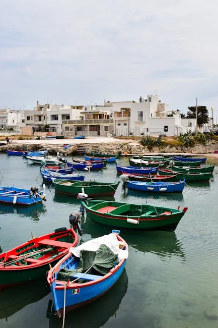 Colorful boats moored in a small harbor near Lecce