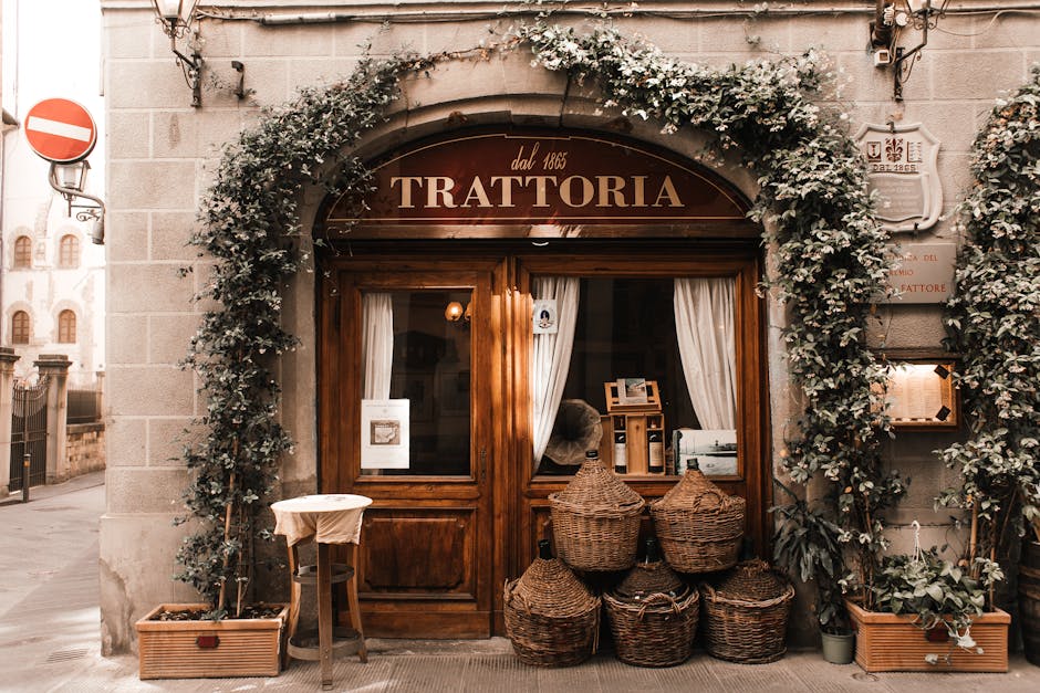 Façade of a trattoria in Lecce with baskets and ivy